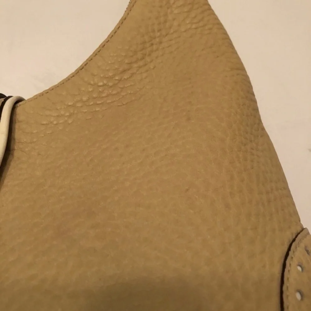 Coach cream pebbled leather perforated hobo bag